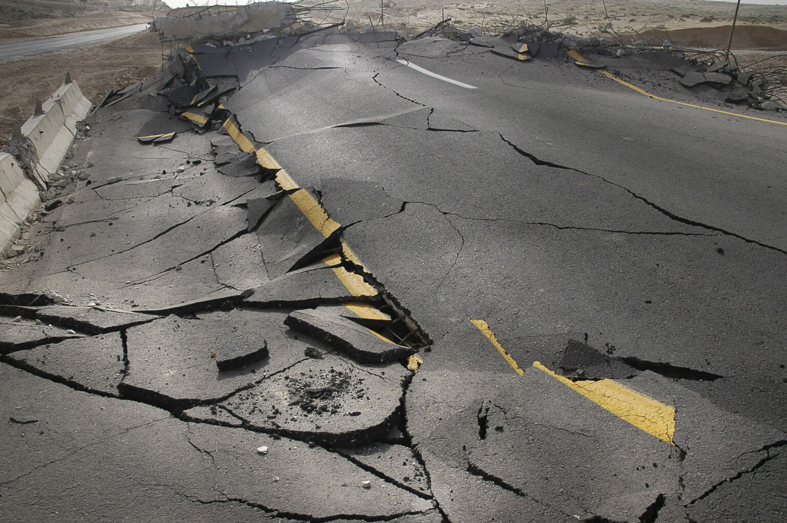 Cracked,Asphalt,After,Earthquake