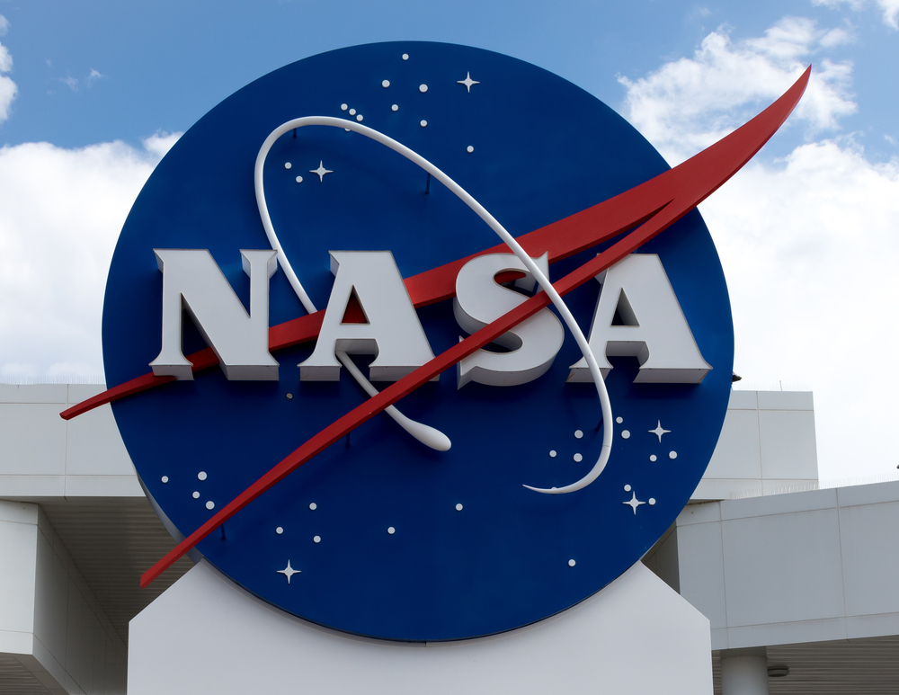 Nasa,Sign,At,Cape,Canaveral,,Kennedy,Space,Center,With,Blue