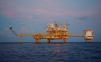 Industrial,Offshore,Oil,And,Gas,Rig,Platform,With,Beautiful,Sky