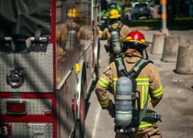 Firefighters,Walking,To,The,Fire,Truck,After,Responding,An,Emergency