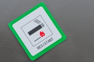 Fire,Resistant,Sign,On,Grey,Leather,Furniture.