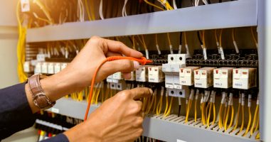 Electrician,Measurements,With,Multimeter,Testing,Current,Electric,In,Control,Panel.
