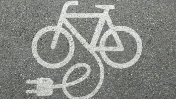 E-bike electric bike symbol on road